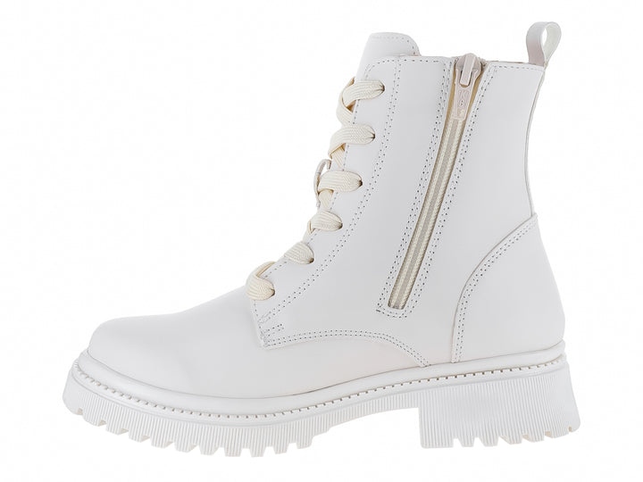 Botas blancas para niña con detalles de estrellas doradas y suela blanca dentada.