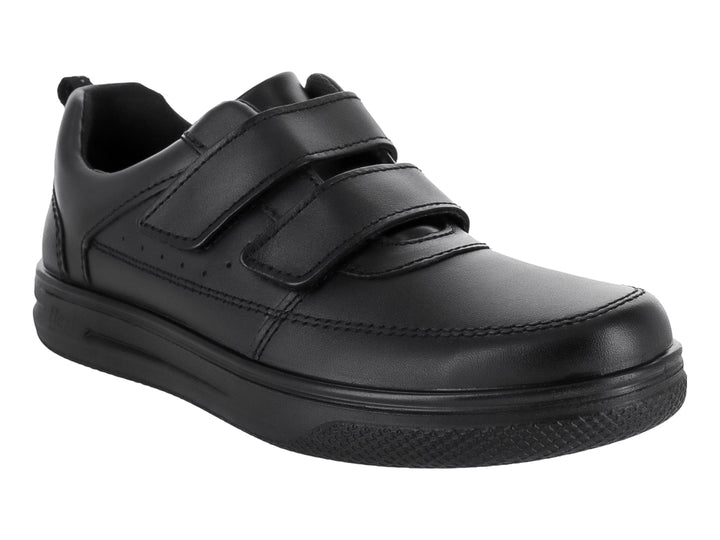 Zapato Flexi color negro para niño con cierre de dos cintas de velcro y suela cómoda.