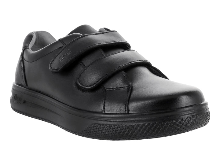 Zapato Flexi negro para niño con cierre de velcro y suela cómoda.