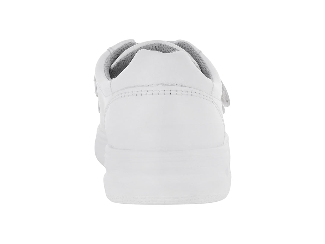 Zapato Flexi blanco para niño o niña con cierre de dos correas de velcro y suela blanca.