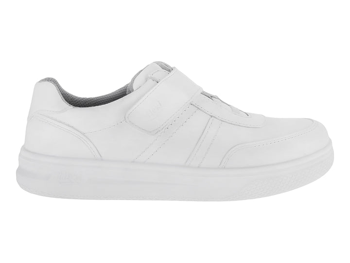 Zapato infantil color blanco de la marca Flexi con cierre de velcro y suela blanca.