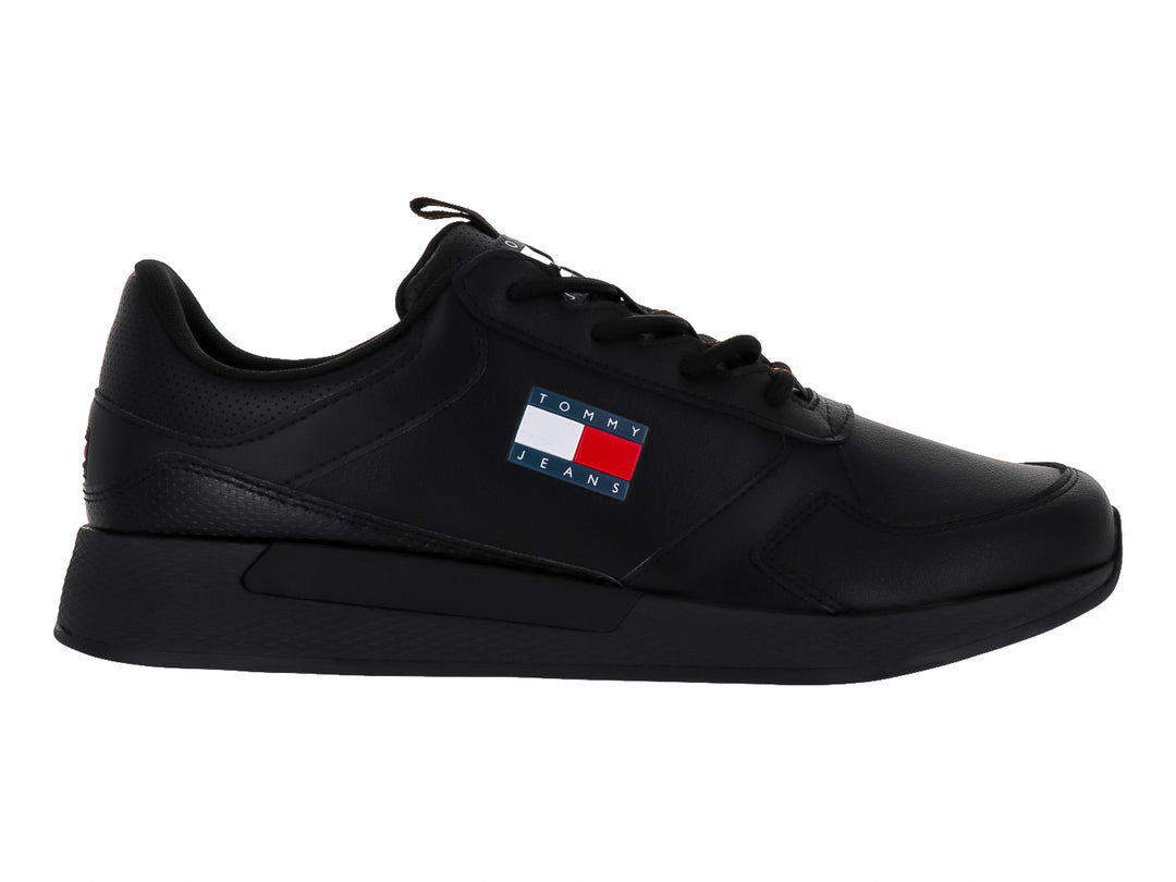 Tenis Tommy Hilfiger Flexi Runner en color negro con logotipo de Tommy Jeans en el lateral.