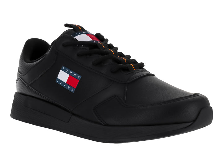 Tenis Tommy Hilfiger Flexi Runner en color negro con logotipo de Tommy Jeans en el lateral.