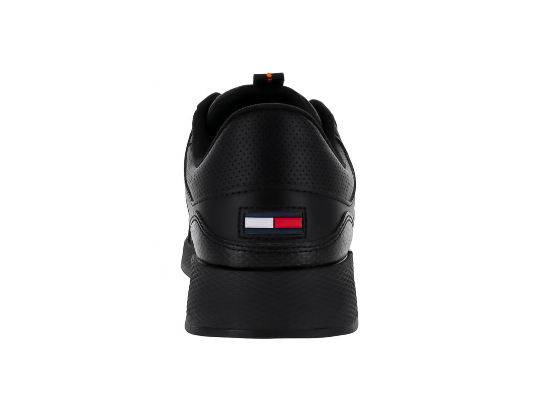 Tenis Tommy Hilfiger Flexi Runner en color negro con logotipo de Tommy Jeans en el lateral.