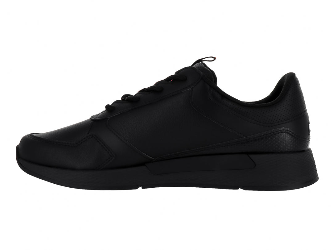 Tenis Tommy Hilfiger Flexi Runner en color negro con logotipo de Tommy Jeans en el lateral.