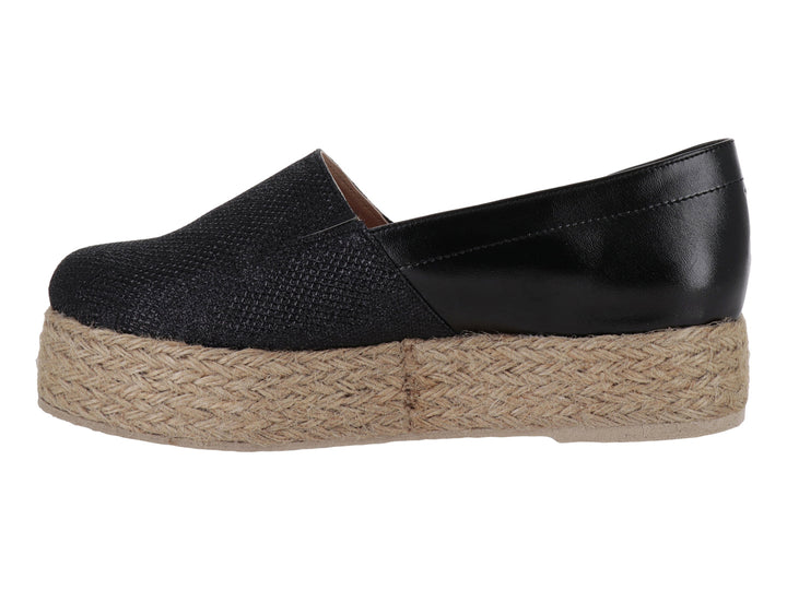 Zapato plataforma negro con suela de yute tejido y parte superior combinada de piel sintética y tela.