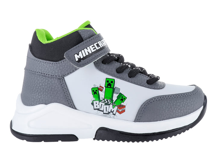Tenis deportivos para niño en colores blanco y gris con motivos de Minecraft y correa de velcro.
