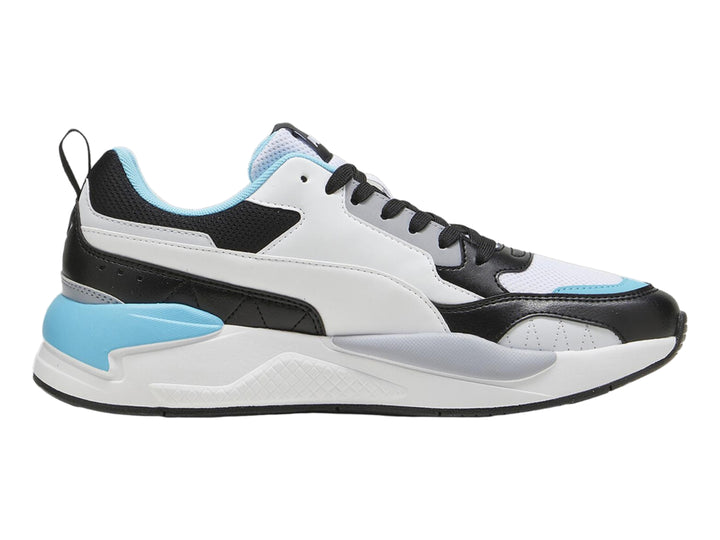 Tenis PUMA X-RAY 2 SQUARE en colores blanco, negro y aqua con suela gruesa.