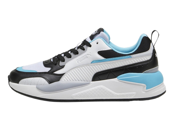 Tenis PUMA X-RAY 2 SQUARE en colores blanco, negro y aqua con suela gruesa.