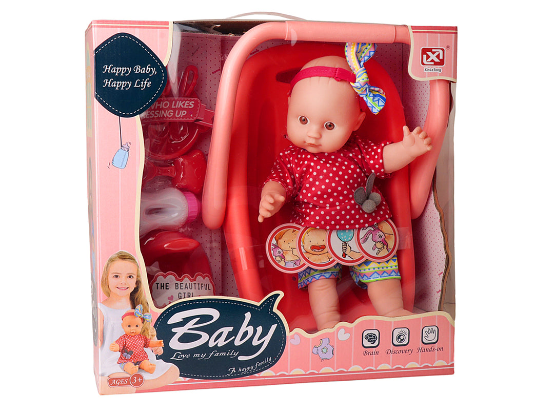 Set de muñeca bebé con accesorios y tina en color rosa, empaquetado en caja transparente.