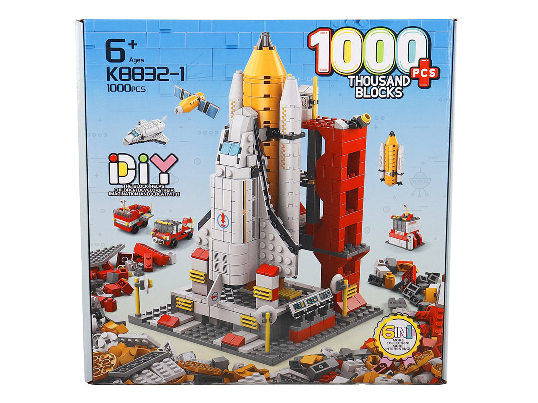 Caja de juguete KELDER TOYS con set de 1000 bloques de construcción para armar un cohete y estación espacial.