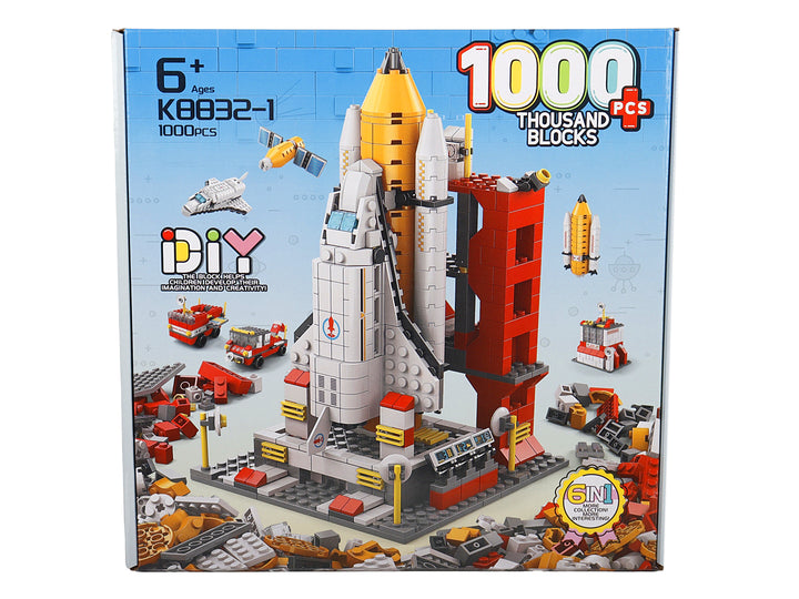 Caja de juguete KELDER TOYS con set de 1000 bloques de construcción para armar un cohete y estación espacial.