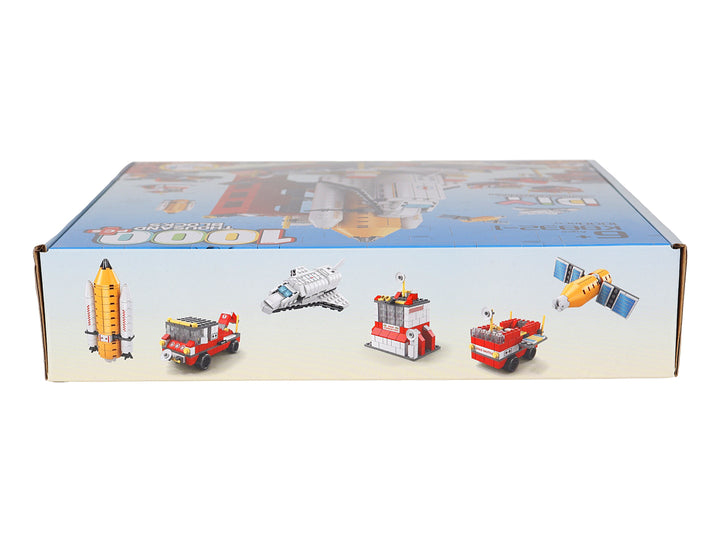 Caja de juguete KELDER TOYS con set de 1000 bloques de construcción para armar un cohete y estación espacial.