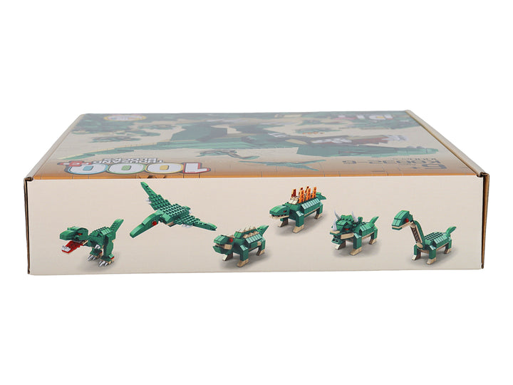 Caja de juguete de bloques de construcción con un dinosaurio T-Rex verde armado y 1000 piezas.
