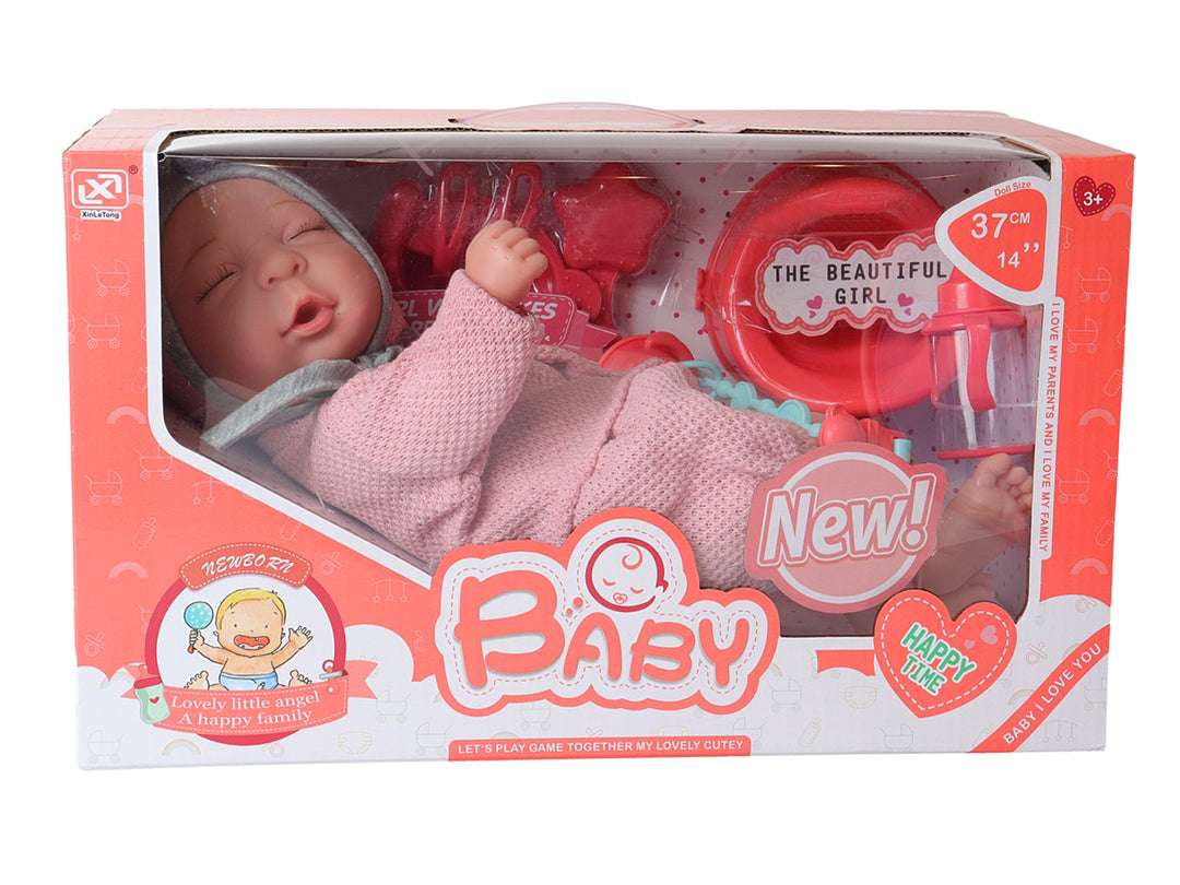 Muñeco bebé con ropa rosa y accesorios en caja, marca Kelder Toys.