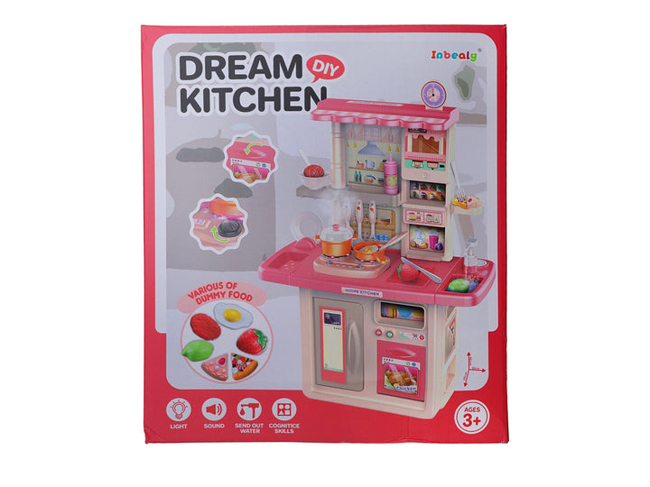 Set de cocina de juguete rosa y blanco con accesorios de comida plástica en su empaque.