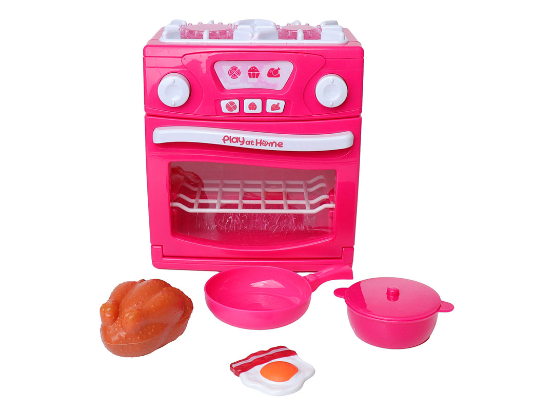 Juego de horno de juguete color rosa con accesorios, empacado en caja blanca y rosa.