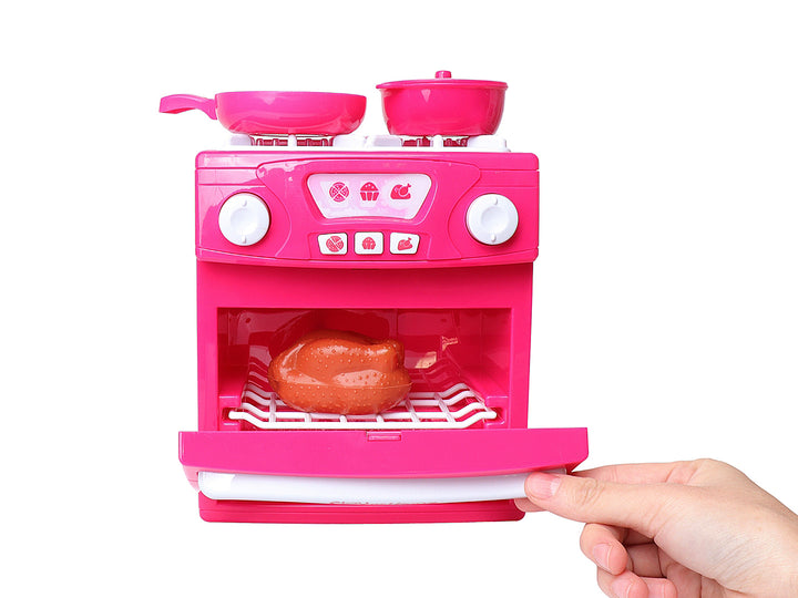Juego de horno de juguete color rosa con accesorios, empacado en caja blanca y rosa.