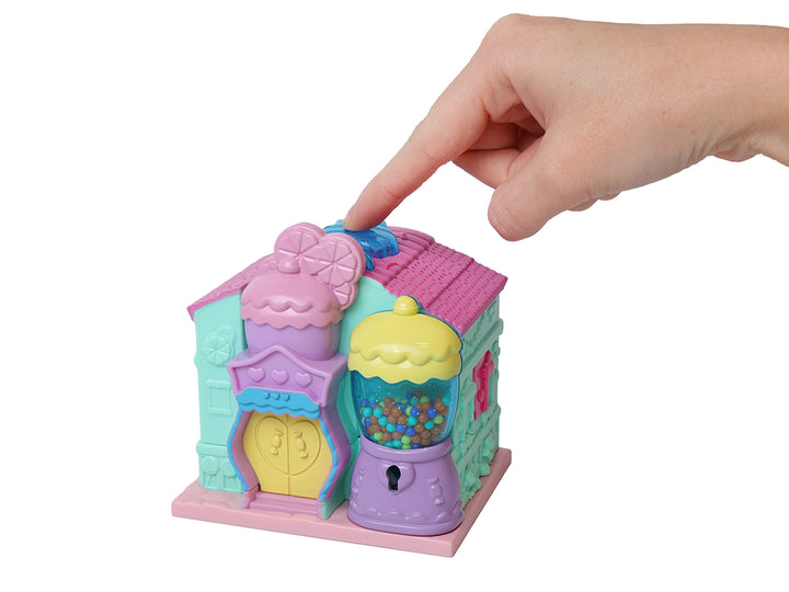 Juguete Casita Sweet Candy Room de colores pastel con accesorios y figuras, empacado en caja.