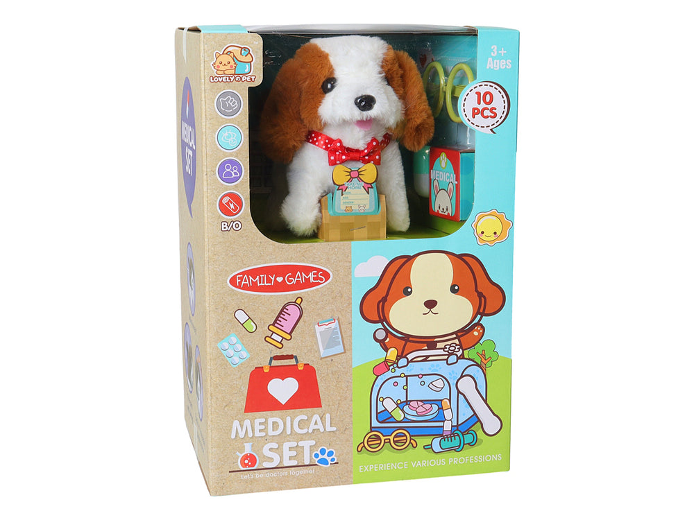 Set de juguete de veterinario con perrito de peluche, transportadora azul y accesorios médicos coloridos.