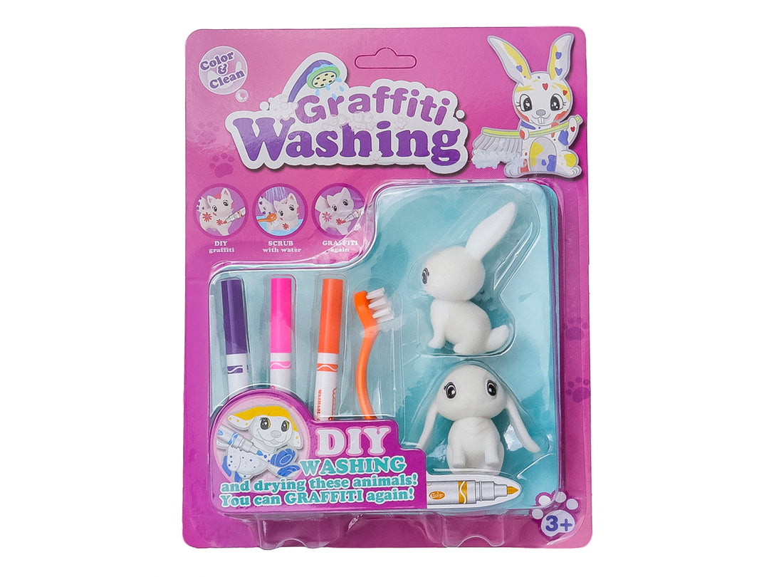 Dos sets de juguetes Graffiti Washing con figuras de animales blancos, marcadores de colores y cepillos en empaque morado.