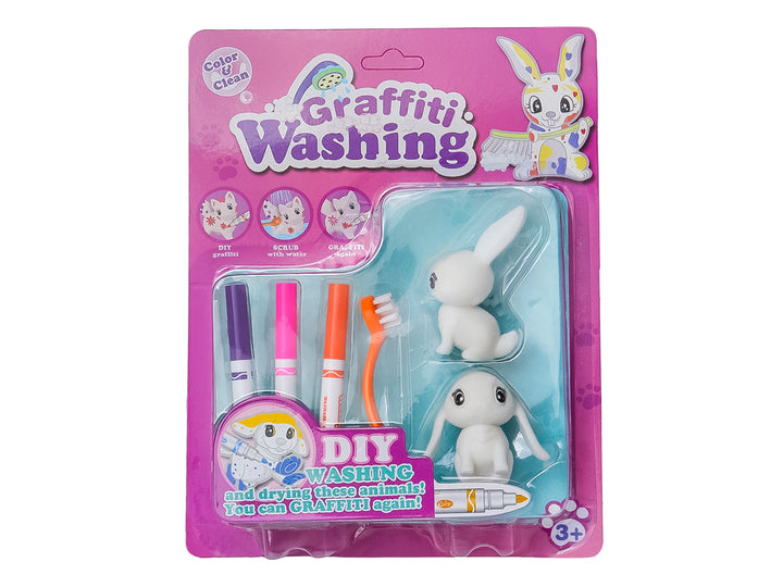 Dos sets de juguetes Graffiti Washing con figuras de animales blancos, marcadores de colores y cepillos en empaque morado.