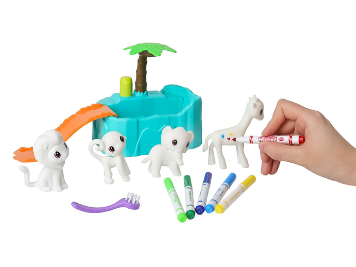 Set de juguete educativo con figuras de animales blancos, marcadores de colores y una base azul con palmera.