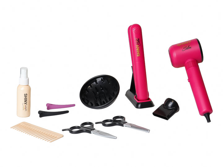 Set de juguete de peluquería de 11 piezas en color rosa y negro, incluye secadora, tijeras y peine en empaque transparente.