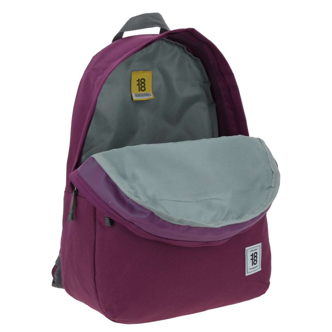 Mochila juvenil de color lila con detalles en gris y múltiples compartimentos frontales.