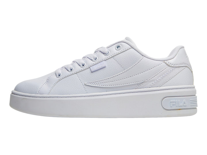 Tenis FILA blancos de plataforma con suela gruesa y cordones, vista lateral.