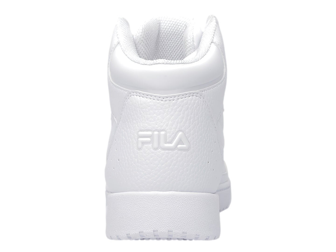 Tenis FILA blancos de corte alto con textura granulada y suela blanca.