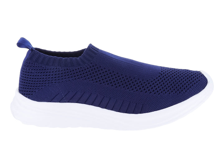 Zapato deportivo slip-on de color azul marino con suela blanca gruesa y material textil tejido.