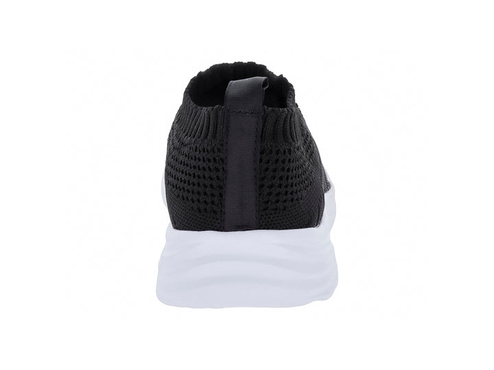 Tenis negros de textil con suela blanca y detalles brillantes en la punta.