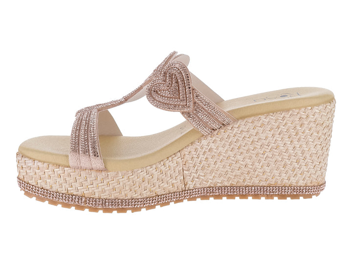 Sandalia de cuña color oro rosado con tiras brillantes y plataforma tejida con base de pedrería.