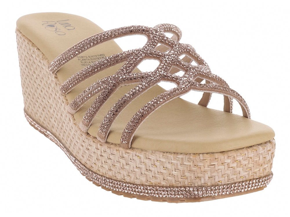 Sandalia de cuña color oro rosado con tiras brillantes y plataforma tejida.