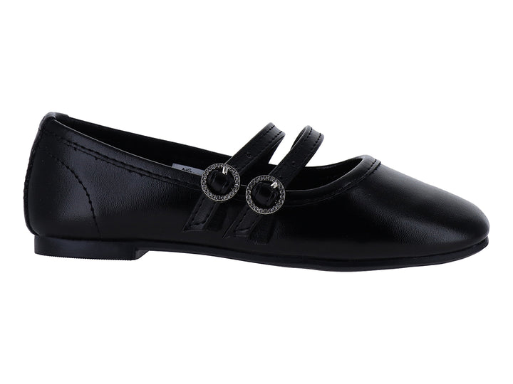 Zapato plano negro con dos correas y hebillas circulares brillantes.