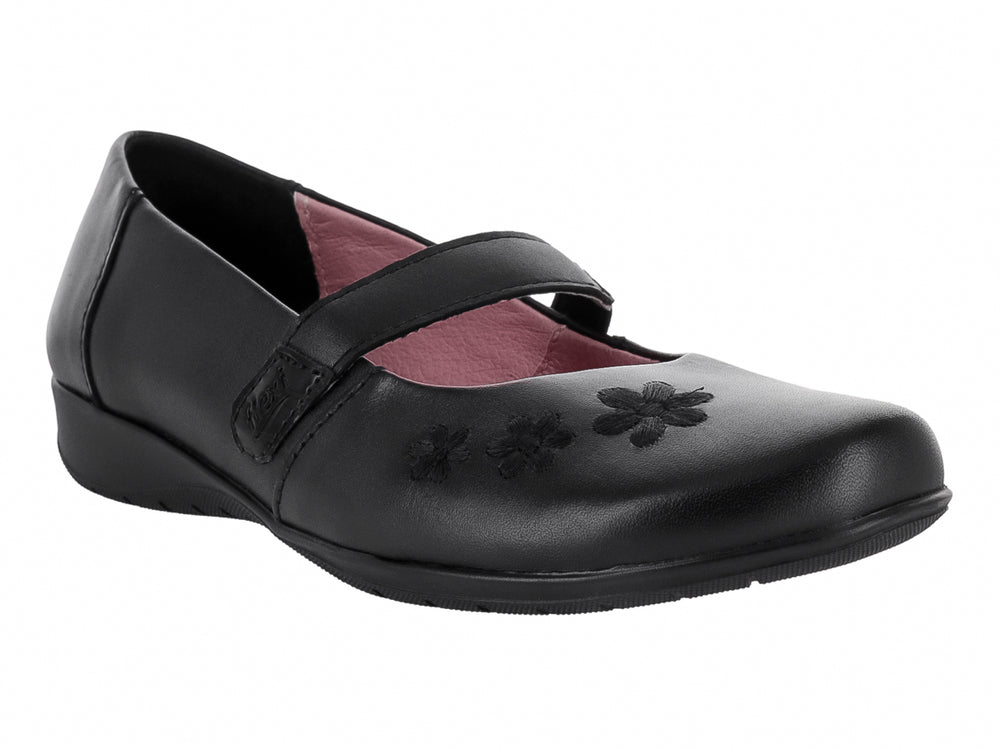 Zapato negro para niña marca Flexi con correa ajustable y detalle de flor en la punta.