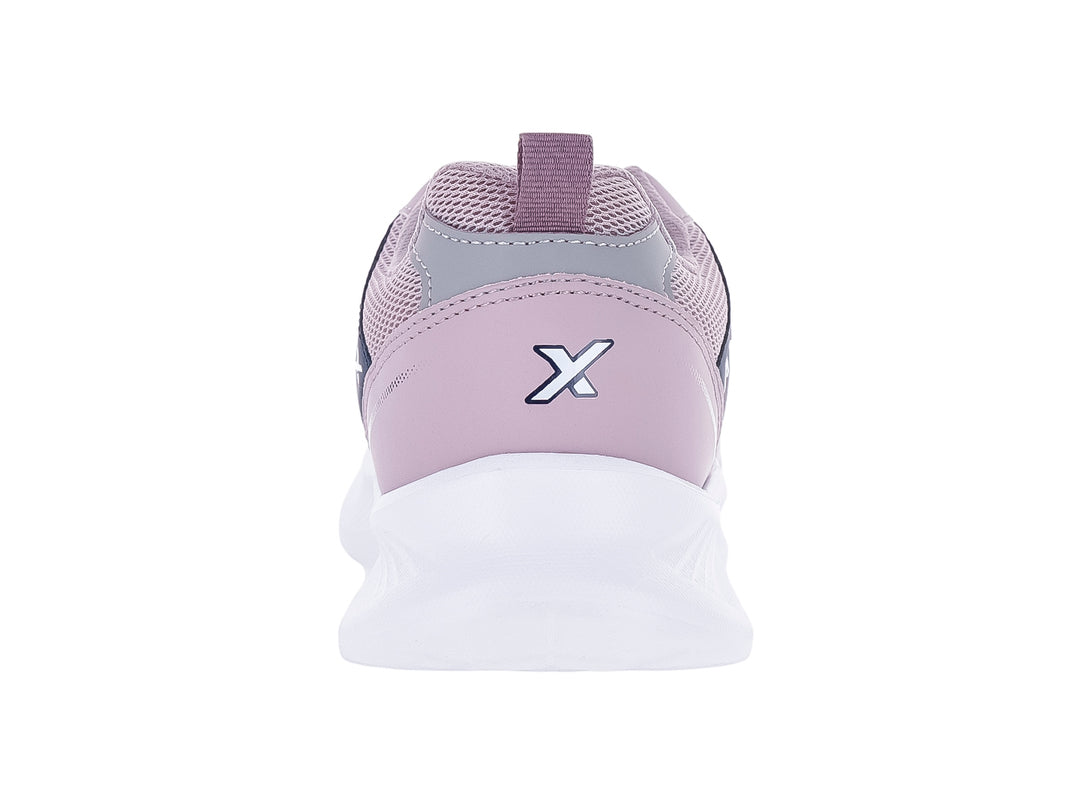 Tenis deportivos Andrax color morado taro con detalles azul marino y suela blanca.