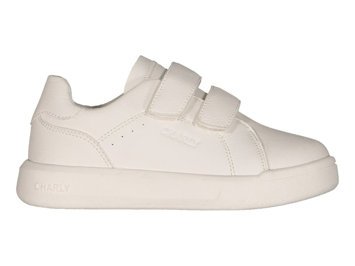 Tenis blancos Charly con cierre de velcro y suela blanca.