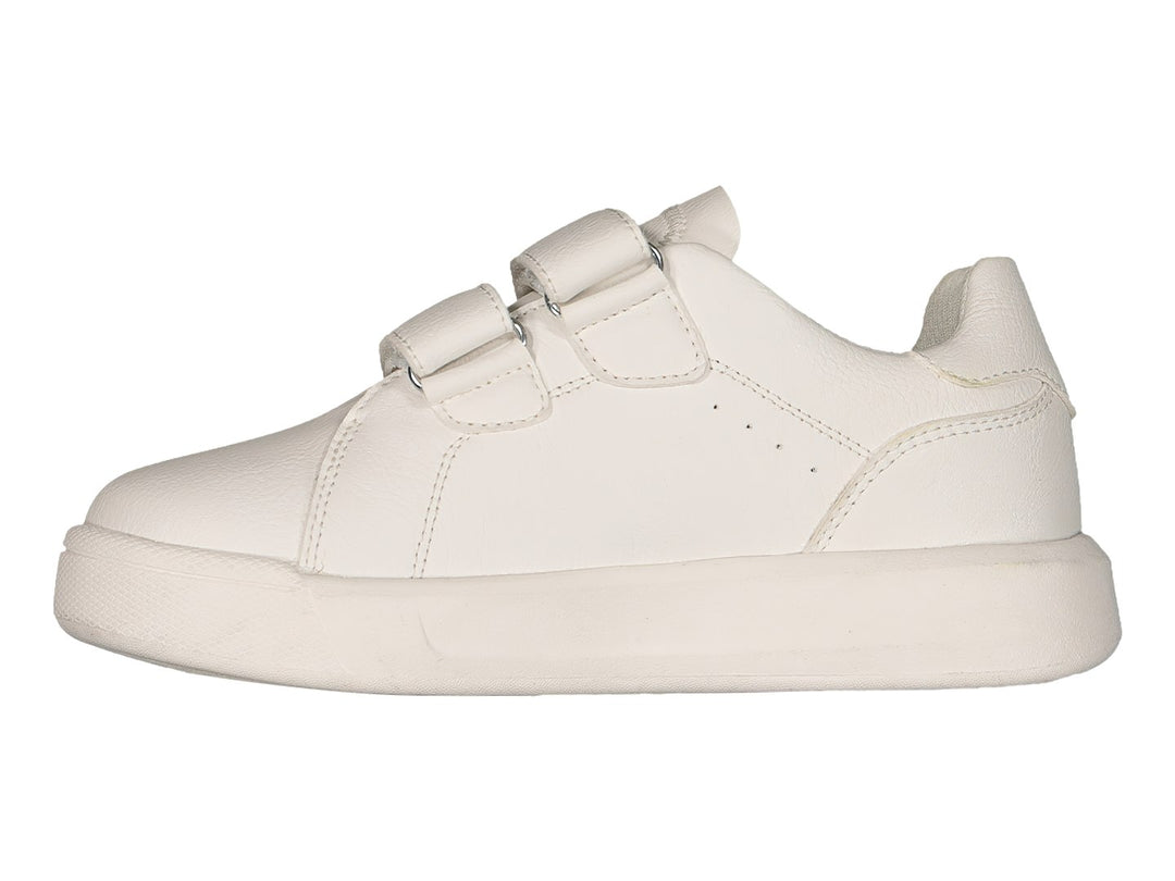 Tenis blancos Charly con cierre de velcro y suela blanca.