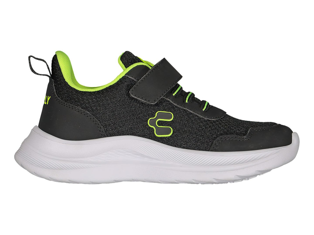 Tenis deportivos Charly color negro con detalles en lima y suela blanca, cierre de velcro y agujetas.