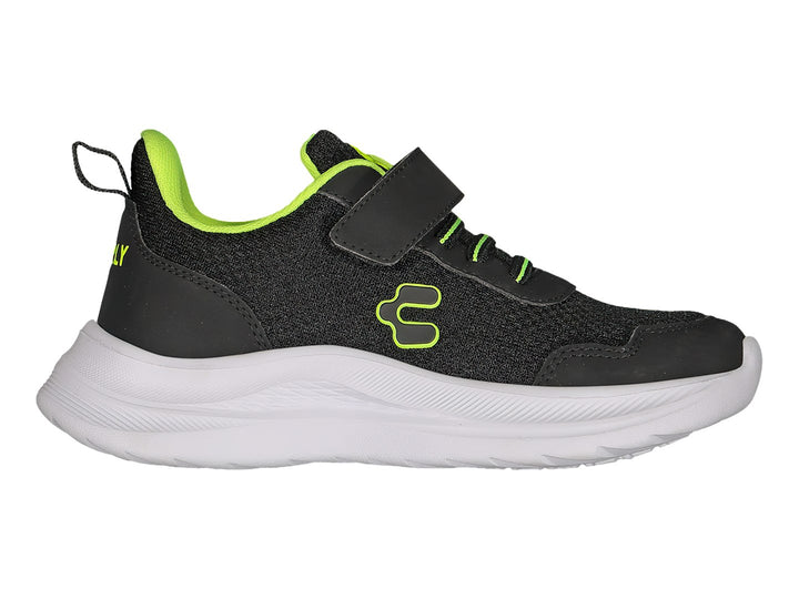 Tenis deportivos Charly color negro con detalles en lima y suela blanca, cierre de velcro y agujetas.
