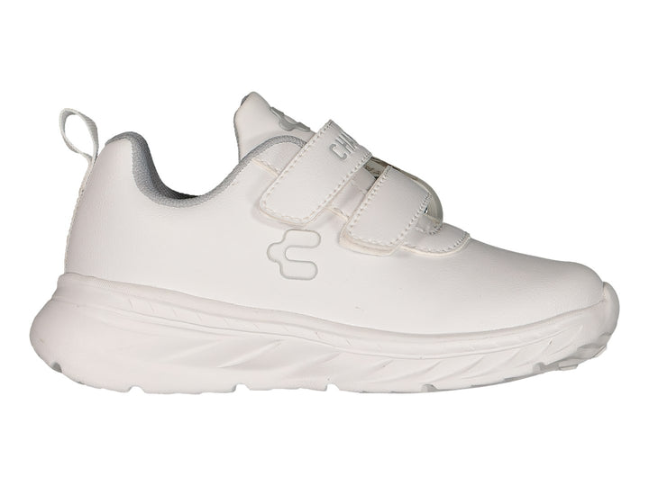 Tenis deportivos blancos de la marca Charly con cierre de velcro y suela gruesa.