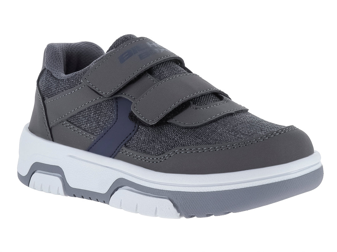 Zapato casual para niño color gris y marino con suela blanca y cierres de velcro.