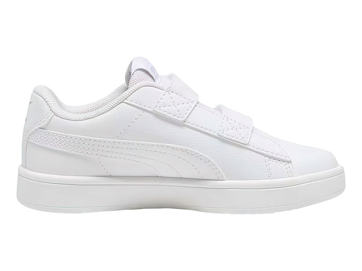 Tenis PUMA blancos para niño con cierre de velcro y suela blanca.
