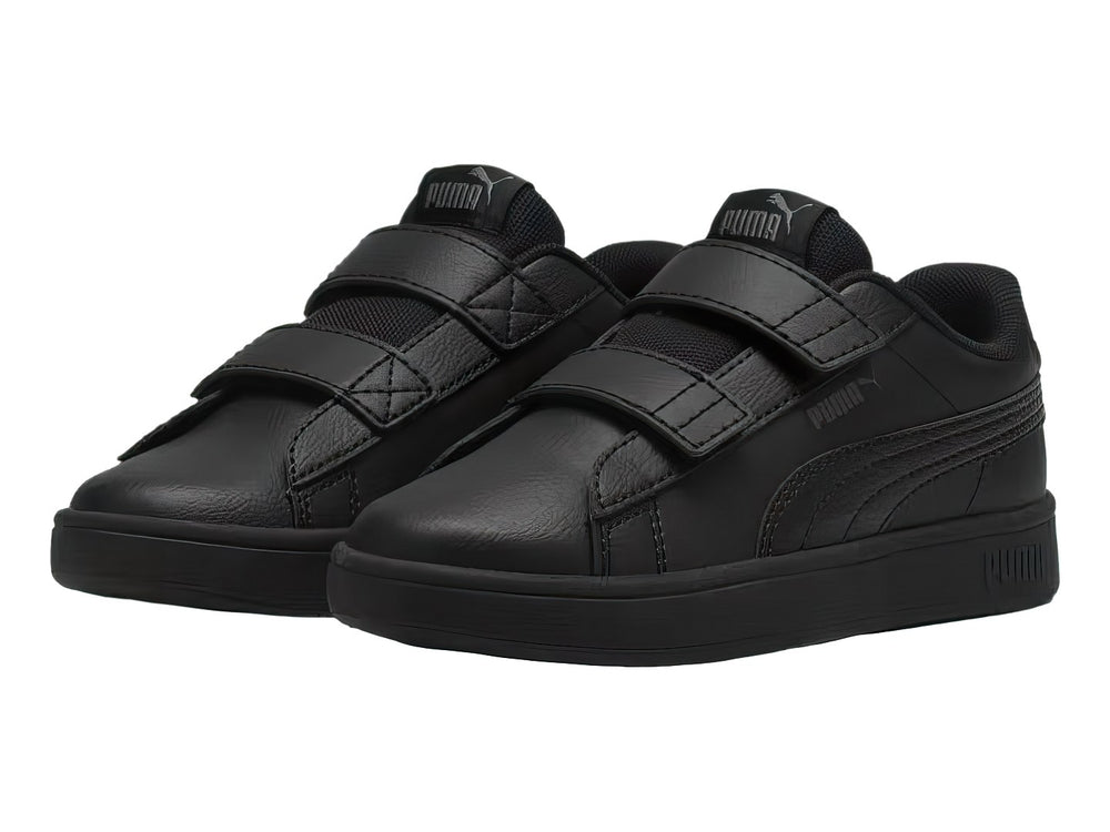 Tenis PUMA Rickie Classic V color negro con cierres de velcro.