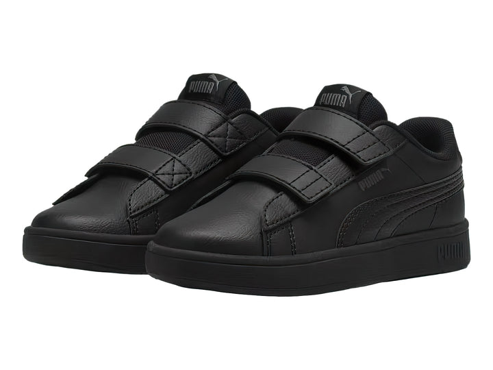 Tenis PUMA Rickie Classic V color negro con cierres de velcro.