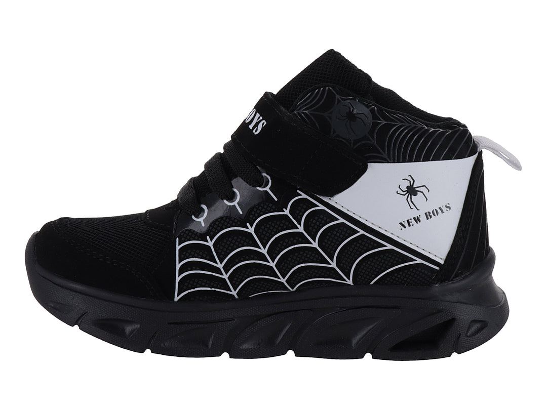 Tenis deportivos para niño color negro con diseño de telaraña blanca y correa de velcro.