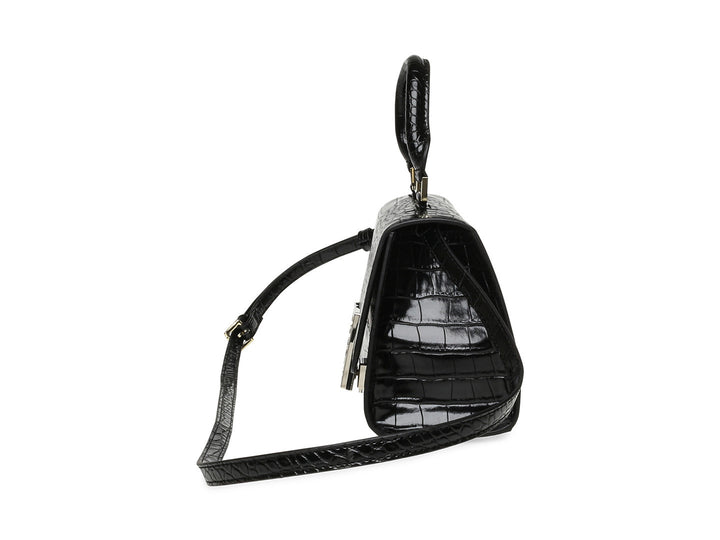 Bolso de hombro Steve Madden color negro con textura de cocodrilo y cierre dorado.