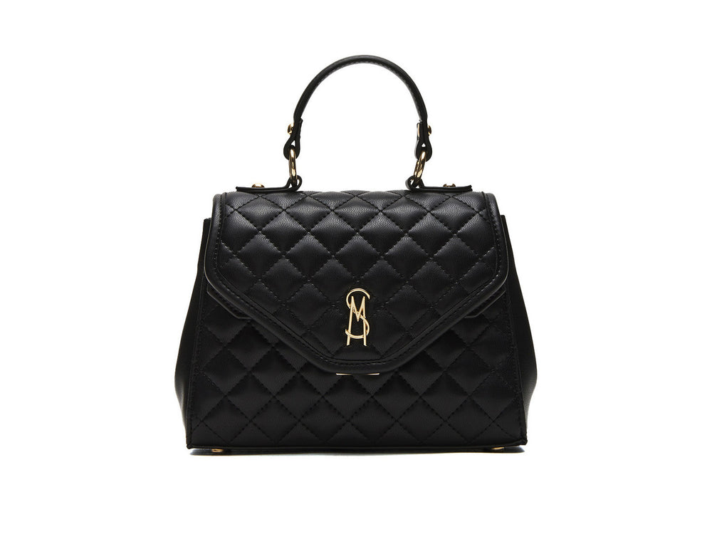 Bolso negro Steve Madden con textura acolchada en forma de diamante y detalles metálicos dorados.